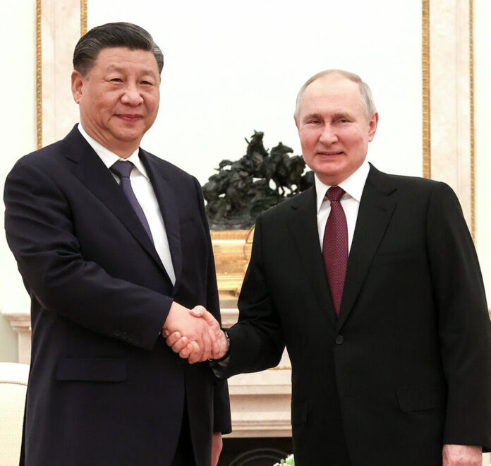 Xi Jinping and Vladimir Putin met Monday at the Kremlin. Russian Presidential Press Office, via Associated Press